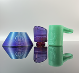 Purple glass puffco pivot mouthpiece with 3D printed stand and tether on a white neutral backround