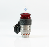 Red with opal spinner cap sitting on top a 3dxl puffco peak chamber on a white backroune