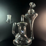 Clear heady recycler on a black backround
