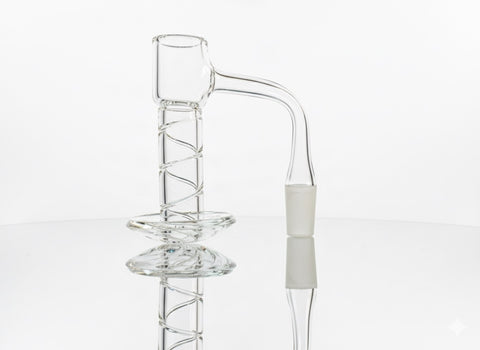 Terp slurper with a spiral design on a neutral white backround