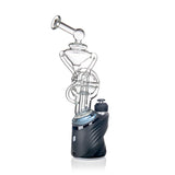 mJ arsenal clear glass recycler sitting on top of Puffco Peak