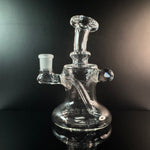 Clear heady dab rig with opal on black backround 