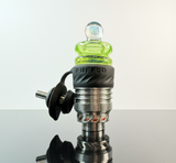 Green with opal puffco peak 3dxl spinner cap on a 3dxl chamber