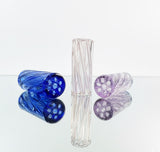 Set of 3 glass filter tips on a neutral white backround