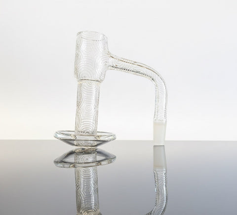 Clear / etched terp slurper on a neutral backround