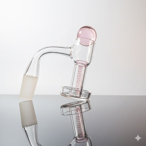 Terp slurper on a neutral backround with pink terp slurper set inside