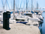 Dr Dabber Switch Go vaporizer / electric E-Rig next to boats in Canada on a marina. 