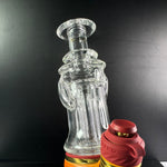 Puffco peak glass canada sitting on top of limited edition daybreak puffco peak pro